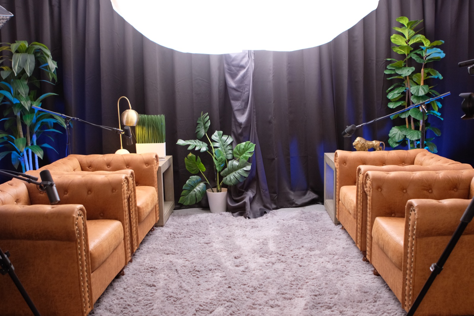 The room: leather chairs facing each other under a soft light at BYND Studios